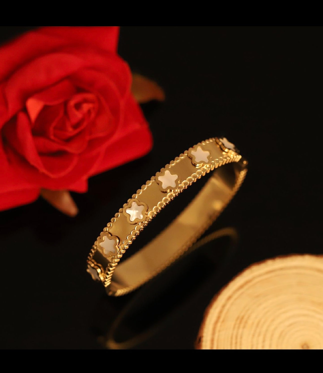 Gold tone Stainless Steel Star motifs Bangle bracelet