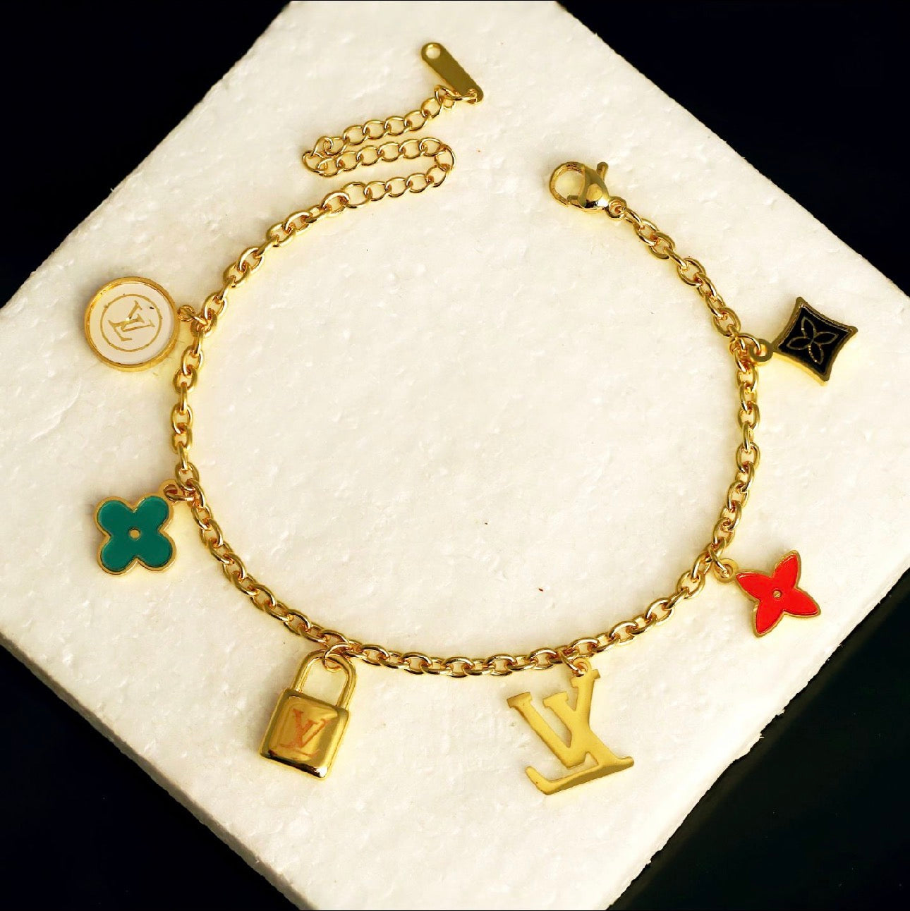 Heritage Icon Multi-Charm Gold Tone Bracelet