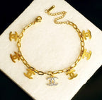 Iconic Luxe Multi-Charm Gold Link Bracelet