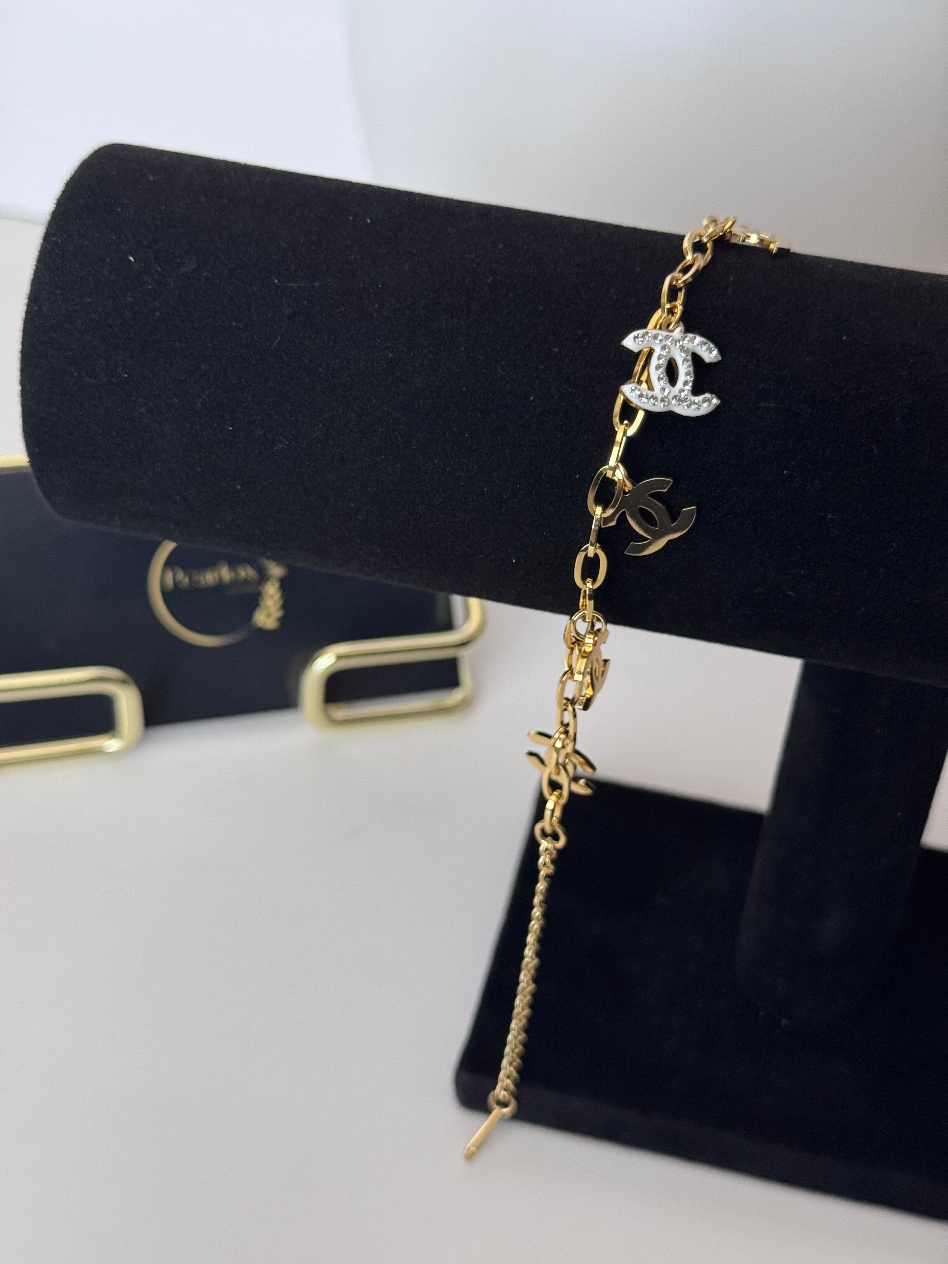 Iconic Luxe Multi-Charm Gold Link Bracelet